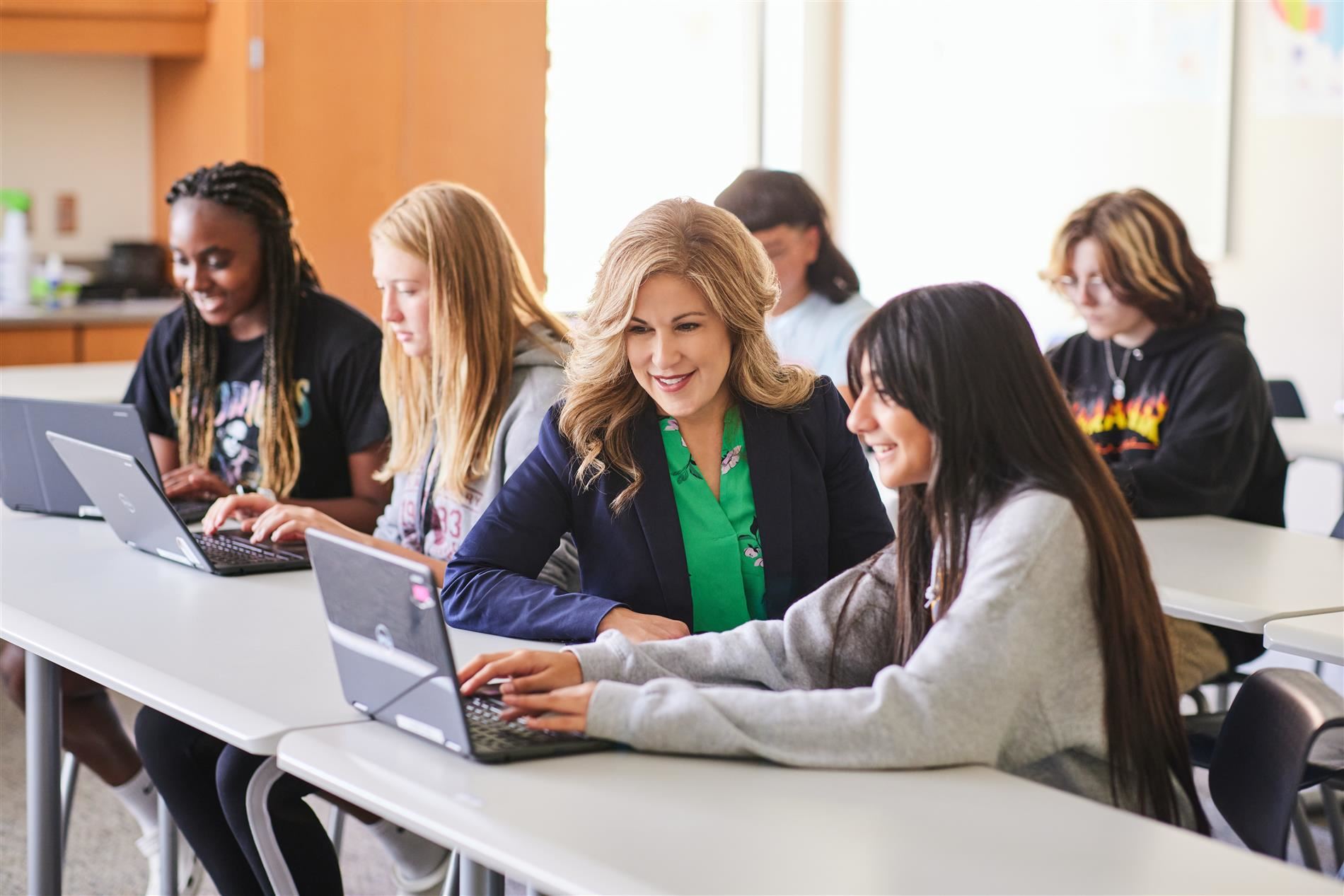 Theresa with students